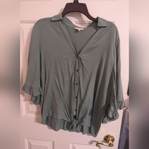 Mid arm length, bell sleeve, front tie, button down shirt